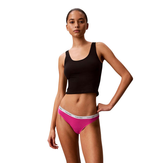 Multipack 5 Slip Bikini Donna Calvin Klein; Tessuto elasticizzato in cotone e lycra con stampe e fantasie assortite. Modello a vita regolare con iconica fascia elastica logata in vita, stile casual 4 stagioni. Fucsia