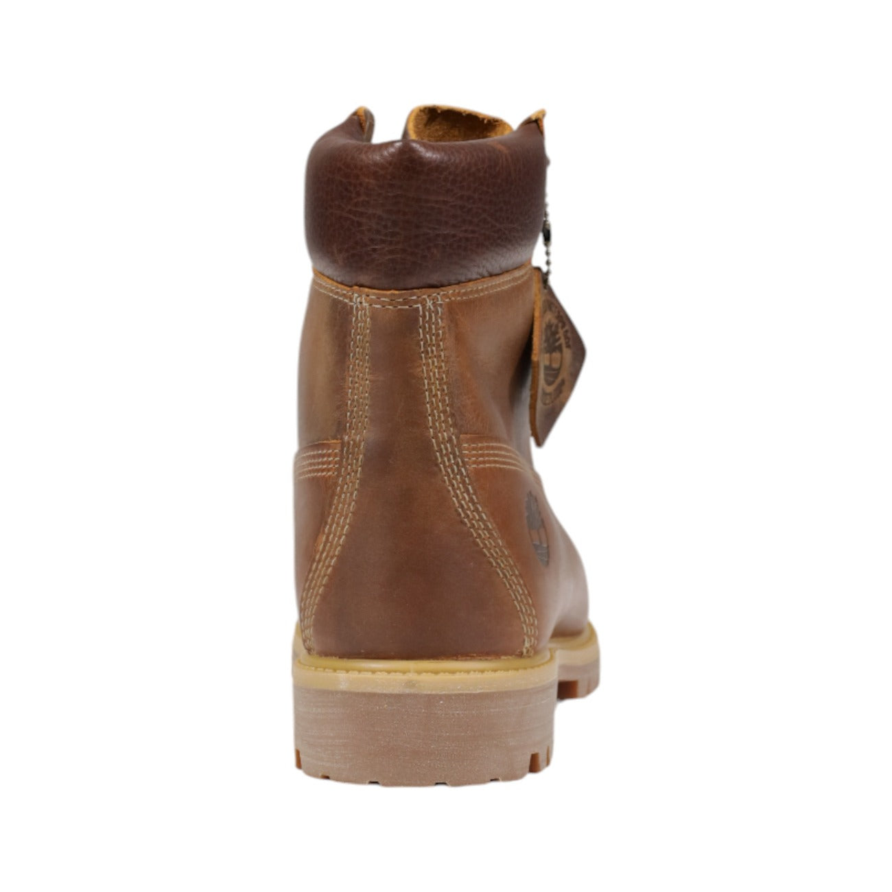 Stivaletto impermeabile da uomo Timberland Premium 6-Inch codice TB127094214 di colore giallo marroncino Wheat. Modello anfibio in pregiata pelle impermeabile con collo imbottito in pelle marrone scuro, lacci stringati e suola carrarmato.