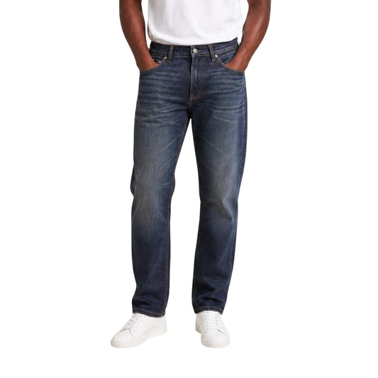 Jeans Regular/Loose Blu Calvin Klein; 100% Cotone. Taglio dritto, 5 tasche, vita media. Cuciture iconiche e logo applicato. Stile retro-contemporaneo, resistente e traspirante. Frontale 