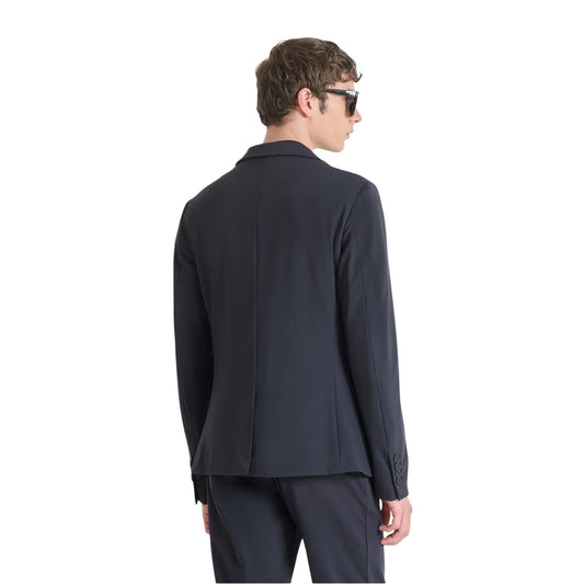 Giacca tecnica Rad slim fit antipiega; tessuto bi-stretch per massima libertà di movimento, chiusura a due bottoni e vestibilità sagomata moderna, perfetta per il business casual. Vista posteriore 