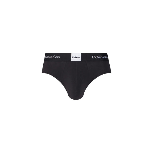 Slip uomo Calvin Klein 3-Pack; 95% Cotone Better Cotton, 5% Elastan. Modello Hip Brief con elastico logato. Intimo uomo resistente, elastico e iconico.