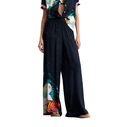 Pantaloni palazzo Desigual DAIKIRI; 100% viscosa. Vita elastica, stampa floreale fondo gamba, vestibilità ampia. Pantaloni estivi donna ultra-leggeri, freschi e traspiranti.