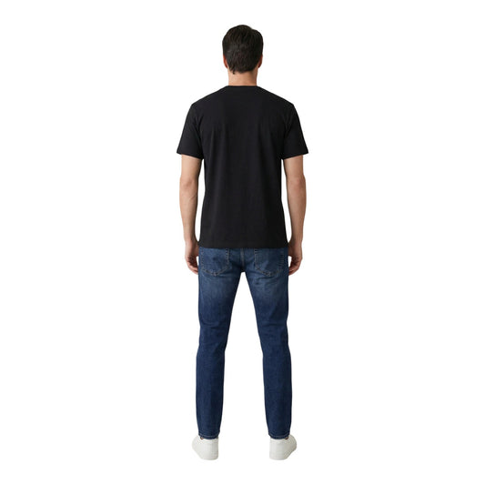 T-shirt Calvin Klein Jeans; 100% Cotone. Vestibilità regolare, logo frontale a contrasto, maniche corte. Maglia uomo traspirante, resistente e iconica per la stagione PE26. Colore nero vista Posteriore 