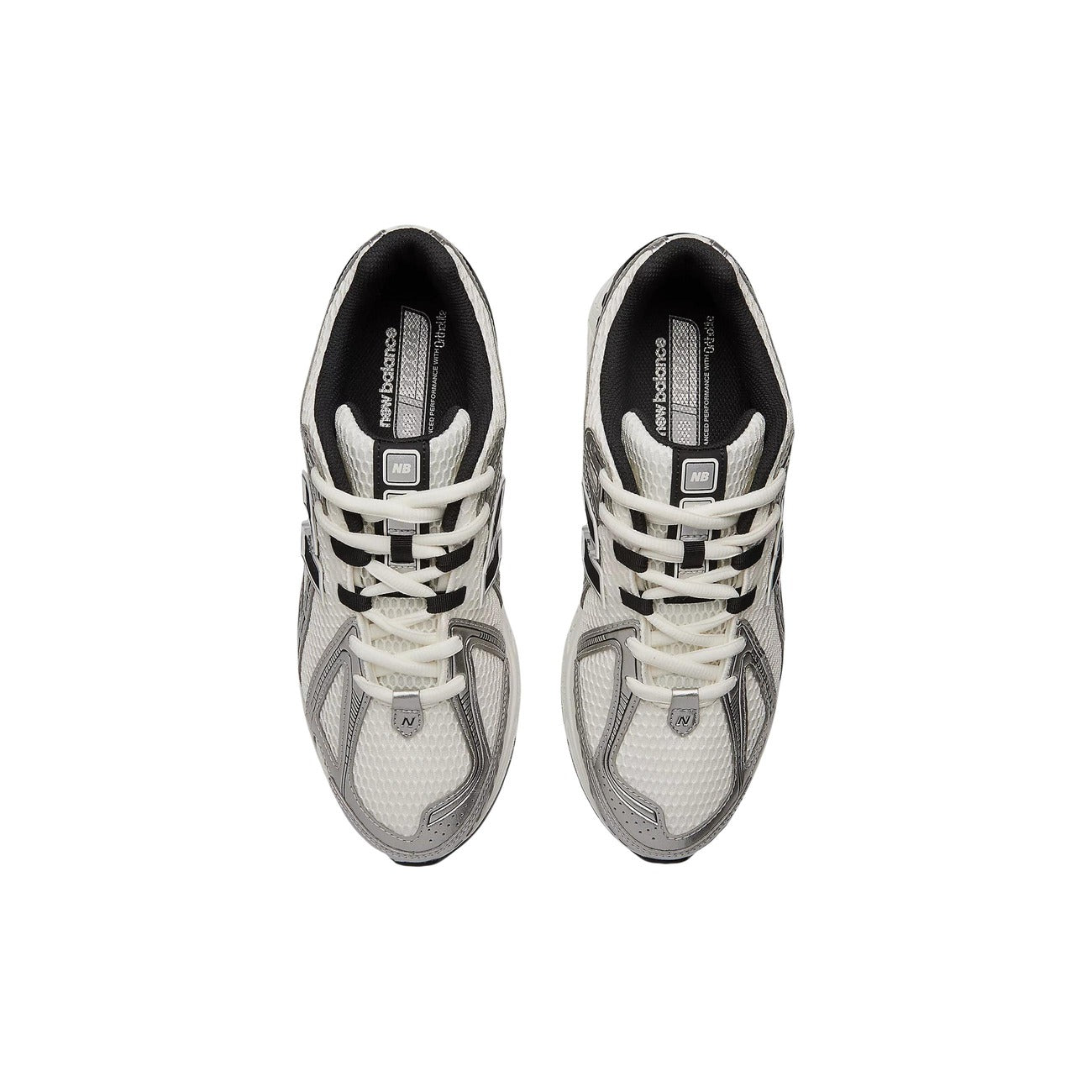 Scarpe New Balance 1906 unisex argento e bianche GC1906ER. Sneakers running basse metallizzate in mesh e materiale sintetico con ammortizzazione ABZORB SBS, supporto Stability Web e suola in gomma, scarpe sportive autunno inverno.
