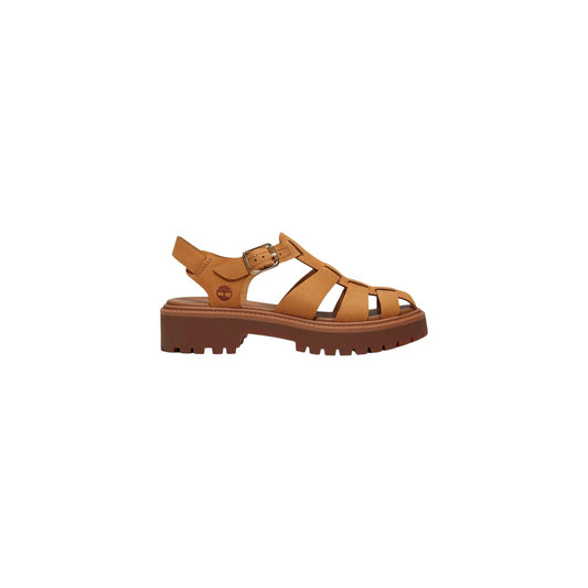Timberland Stone Street Fisherman Sandal, giallo; pelle Premium, suola plateau chunky, fibbia regolabile, comfort OrthoLite®. Il sandalo Fisherman grintoso e iconico. Vista laterale 