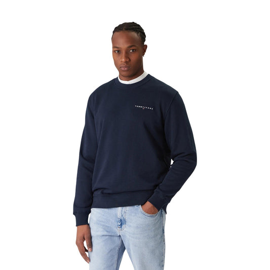 Felpa Tommy Hilfiger Jeans uomo girocollo blu scuro DM0DM20249. Felpa in cotone felpato con scollo tondo, finiture a costine e scritte logo Tommy Jeans ricamate sul petto, abbigliamento casual uomo autunno inverno.