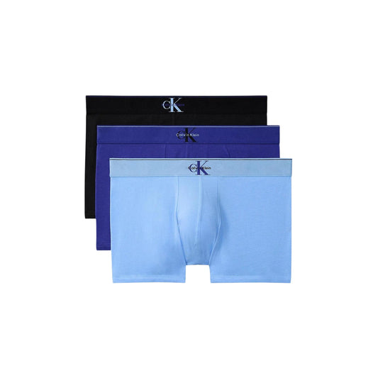 Pack 3 Boxer Trunk CK; Cotone Stretch. 95% Cotone e 5% Elastam, vita regolare con fascia logata, design traspirante e aderente. Qualità premium per l'uso quotidiano, supporto eccellente. Nero blu azzurro 
