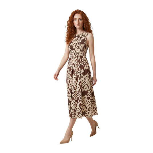 Vestito Midi JDY Diego; Geometrico, 100% Cotone. Corpetto smock elasticizzato, fantasia geometrica, senza maniche. Gonna a balze vaporosa, stile elegante e leggero. Vista Frontale 