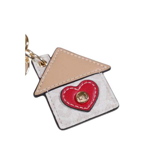 Portachiavi Casetta Liu Jo; Bianco. 100% Poliuretano, hardware dorato con logo inciso. Design originale con cuore, accessorio versatile e idea regalo simbolica.