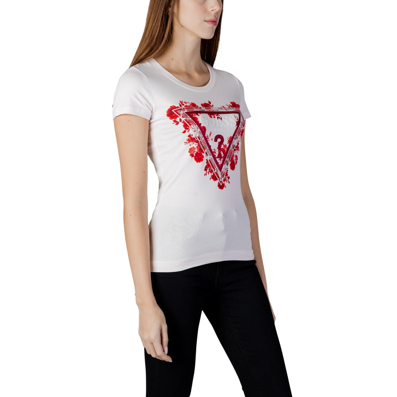T-shirt Guess Rosa Chiaro; 95% Cotone, 5% Elastam. Logo triangolo con fiori, vestibilità slim, maniche corte. Ideale per look casual-chic Primavera/Estate.