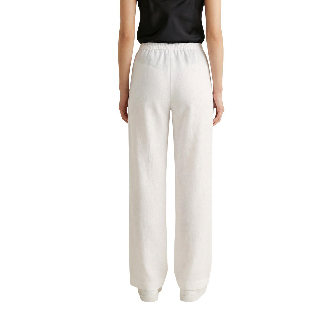Pantaloni Wide Leg Bianchi Only; Effetto Lino. Vita elastica con coulisse, tessuto leggero in viscosa, vestibilità ampia. Freschezza e stile minimalista per l'estate. Vista posteriore 