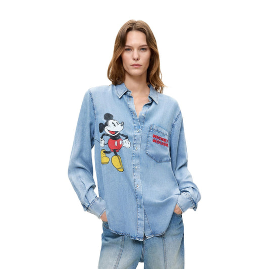 Camicia Desigual donna jeans Mickey Mouse CAM MICKEY. Camicia in denim di cotone blu a manica lunga con stampa Topolino Disney, taschino e bottoni frontali, abbigliamento donna autunno inverno.