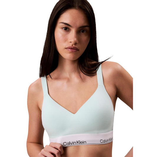 Bralette Verde Donna Calvin Klein Lift; Tessuto elasticizzato in cotone e modal setoso con coppe preformate. Fascia senza cuciture, spalline regolabili incrociabili e chiusura ammortizzata, stile athleisure primavera-estate. Frontale 