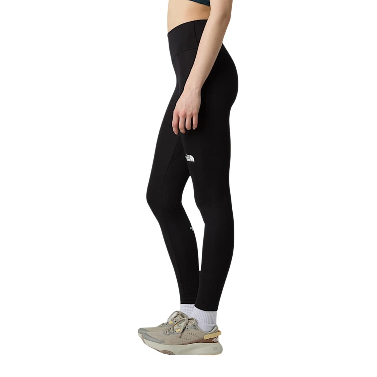 Leggings The North Face Flex donna neri sportivi elasticizzati - vista laterale indossati da modello
