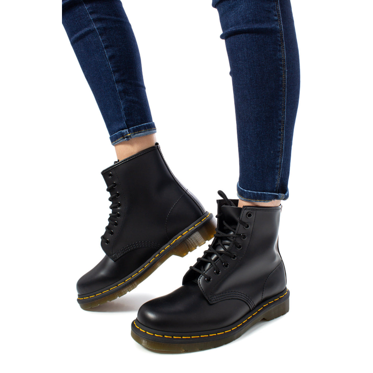 Stivali Dr. Martens STRINGATI 1460 IN PELLE SMOOTH donna neri con lacci suola gomma 100% pelle - vista laterale frontale 
