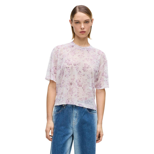 T-shirt Mesh Karl Lagerfeld Jeans; Rosa Floreale. Tessuto a rete trasparente, 95% Poliestere, 5% Elastan. Taglio squadrato con spacchetti laterali. Lavabile a 30°C, stile iconico e moderno. Vista frontale 
